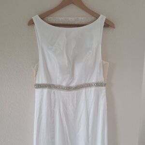 Elegant White Sleeveless Dress with Silver Accents